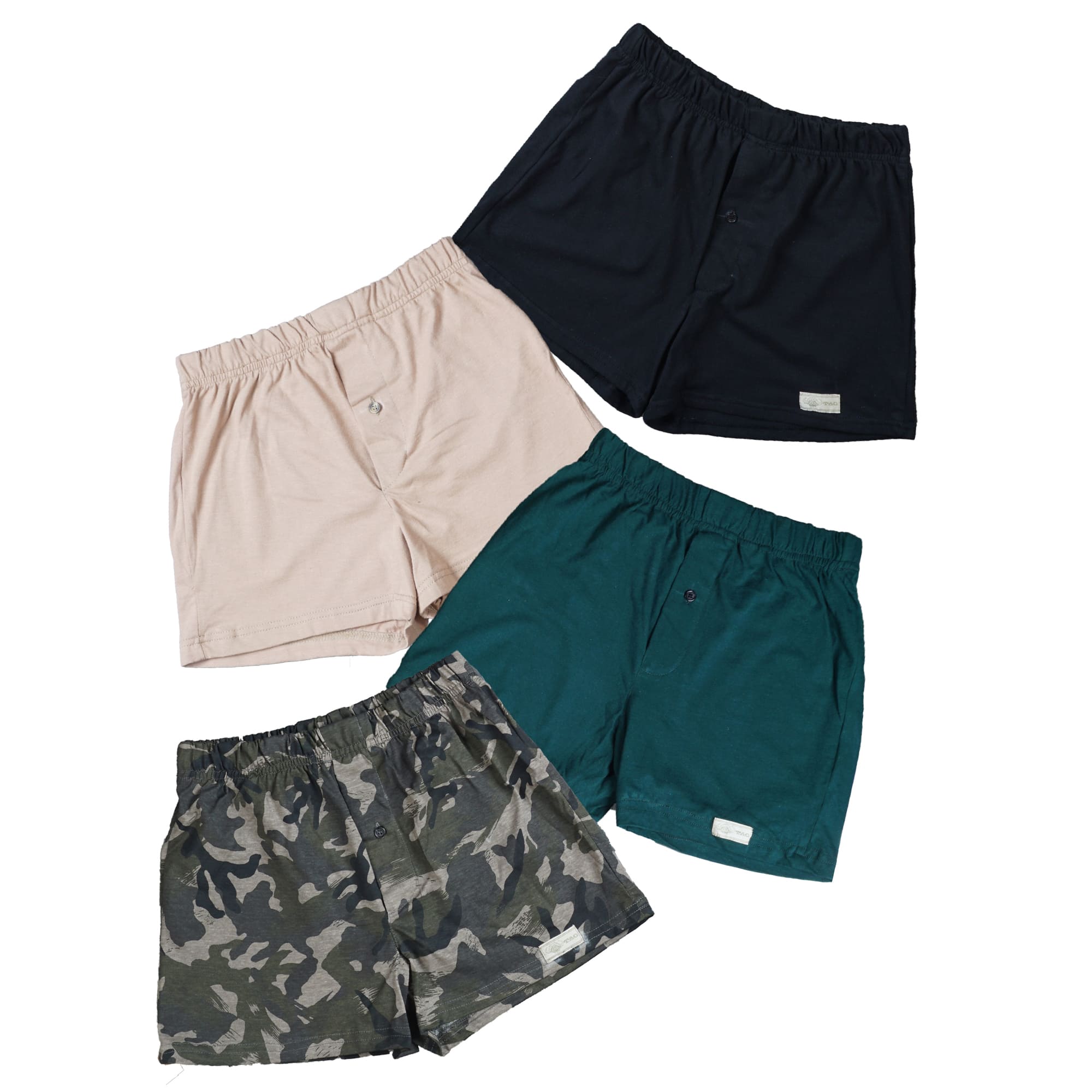 Front view of four pairs of Go Wild Boxers, one Black, one Tan, one Green, and one Olive Drab Jungle Camouflage. Each have an elastic waistband, a buttoned front fly, and a Tag Buffalo label on the bottom front of the left leg. 100% cotton.--2