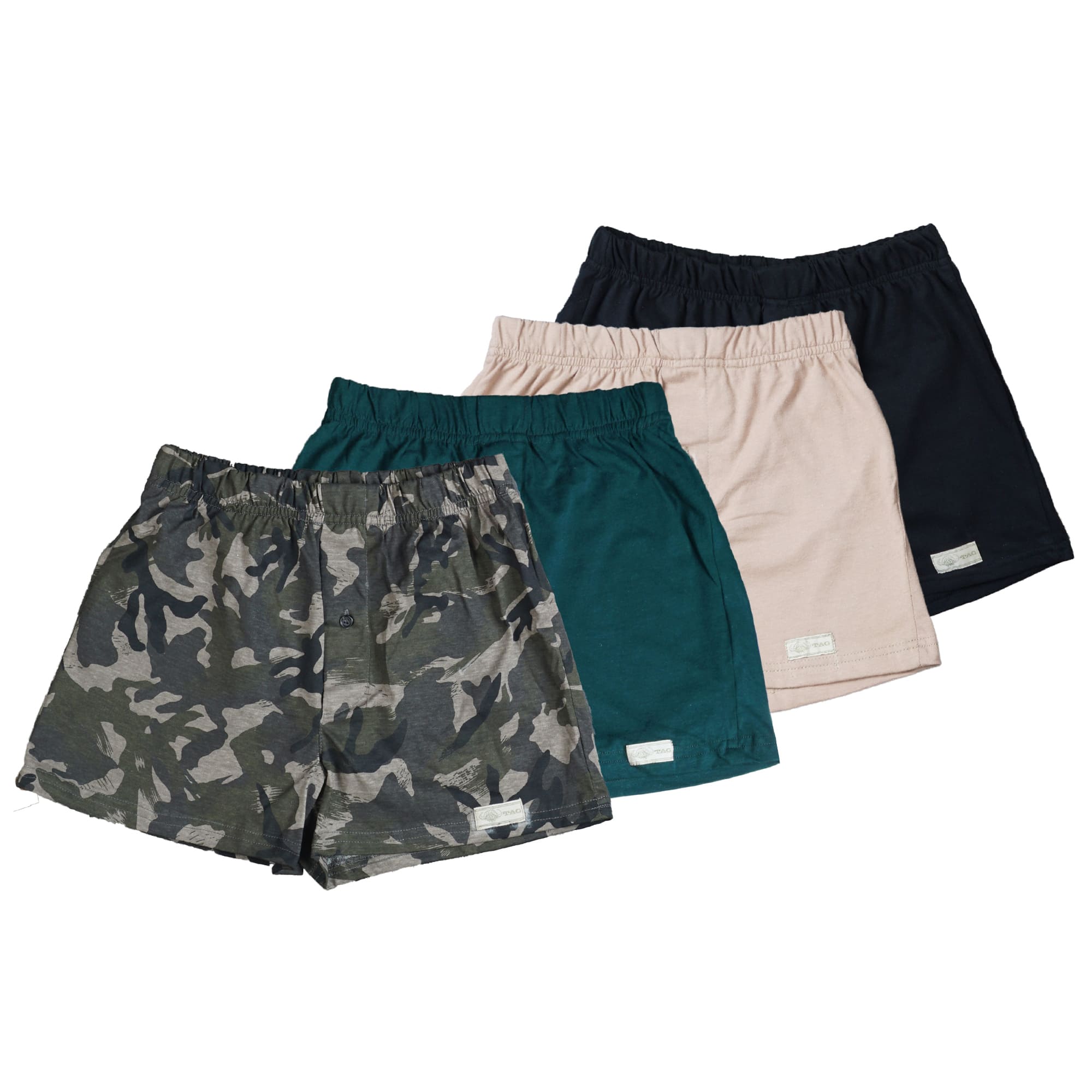 Front view of four pairs of Go Wild Boxers, one Black, one Tan, one Green, and one Olive Drab Jungle Camouflage. Each have an elastic waistband, a buttoned front fly, and a Tag Buffalo label on the bottom front of the left leg. 100% cotton.--1