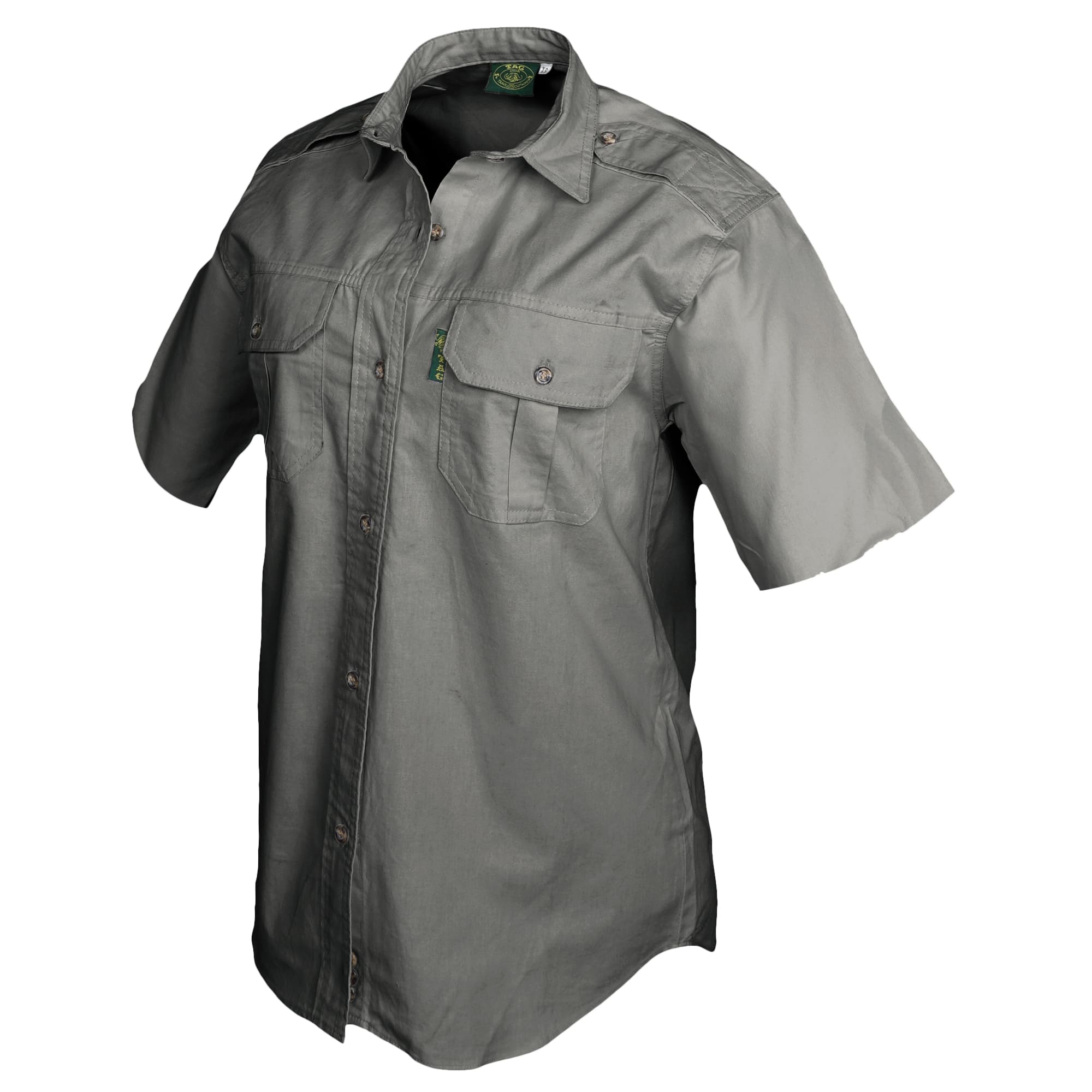 Side view of a Woman's Trail Shirt in Short Sleeves, color Olive. The shirt has two flap-covered chest pockets, functional cross-stitched shoulder straps, a button-front placket, double stitching throughout, and long rounded tails for tucking into pants. 100% cotton.--9