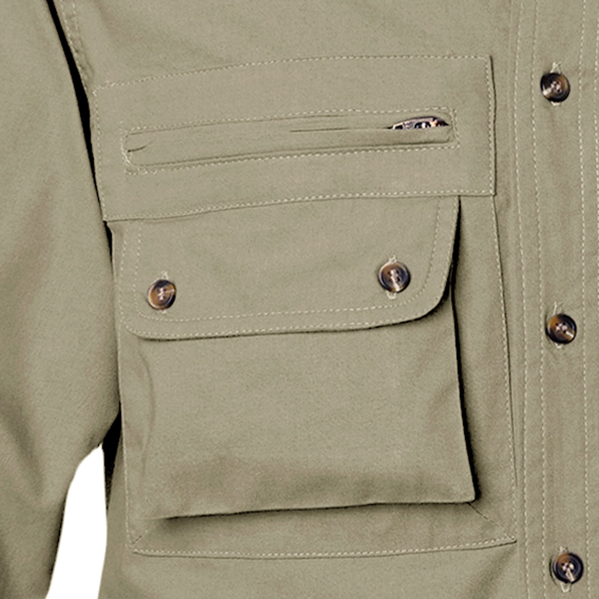 Closeup of a Men's Left-Hand Shooter Shirt in Long Sleeves, color Khaki. The shirt has a zippered chest pocket, a flap-covered chest pocket below, a button-front placket, and double stitching throughout. 100% cotton.--5