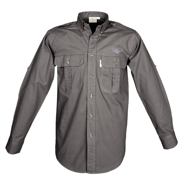 Front view of a Men's Trail Shirt with Buffalo Logo in Long Sleeves, color Olive. The shirt has two flap-covered chest pockets with an embroidered Tag buffalo logo above the left pocket, button-down collars, functional cross-stitched shoulder straps, a button-front placket, double stitching throughout, and long rounded tails for tucking into pants. 100% cotton.