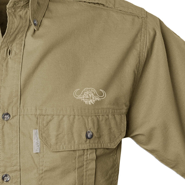 Closeup of a Men's Trail Shirt with Buffalo Logo in Short Sleeves, color Khaki. The shirt has a flap-covered chest pocket on the left side with an embroidered Tag buffalo logo above, button-down collars, functional cross-stitched shoulder straps, a button-front placket, and double stitching throughout. 100% cotton.