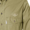 Closeup of a Men's Shooter Shirt with Buffalo Logo in Long Sleeves, color Khaki. The shirt has a flap-covered chest pocket on the left side with an embroidered Tag buffalo logo above, button-down collars, a button-front placket, and double stitching throughout. 100% cotton.