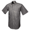 Side view of a Men's Safari Shirt in Short Sleeves, color Olive. The shirt has two flap-covered chest pockets, button-down collars, buttoned roll-up tabs on the sleeve cuffs, a button-front placket, double stitching throughout, and long rounded tails for tucking into pants. 100% cotton.