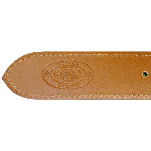 Closeup of an Elephant Game Skin Belt, color Chestnut. The belt has a Tag Safari logo branded inside. Genuine game skin leather.