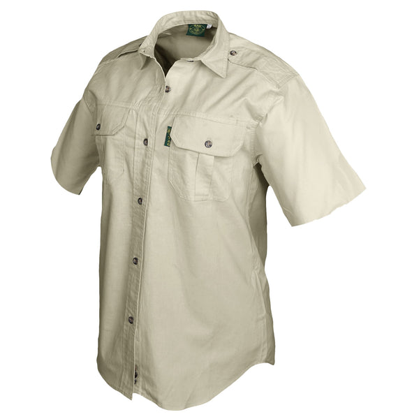 Side view of a Woman's Trail Shirt in Short Sleeves, color Stone. The shirt has two flap-covered chest pockets, functional cross-stitched shoulder straps, a button-front placket, double stitching throughout, and long rounded tails for tucking into pants. 100% cotton.
