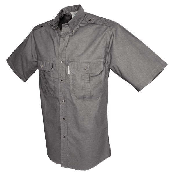 Side view of a Men's Trail Shirt in Short Sleeves, color Olive. The shirt has two flap-covered chest pockets, button-down collars, functional cross-stitched shoulder straps, a button-front placket, double stitching throughout, and long rounded tails for tucking into pants. 100% cotton.