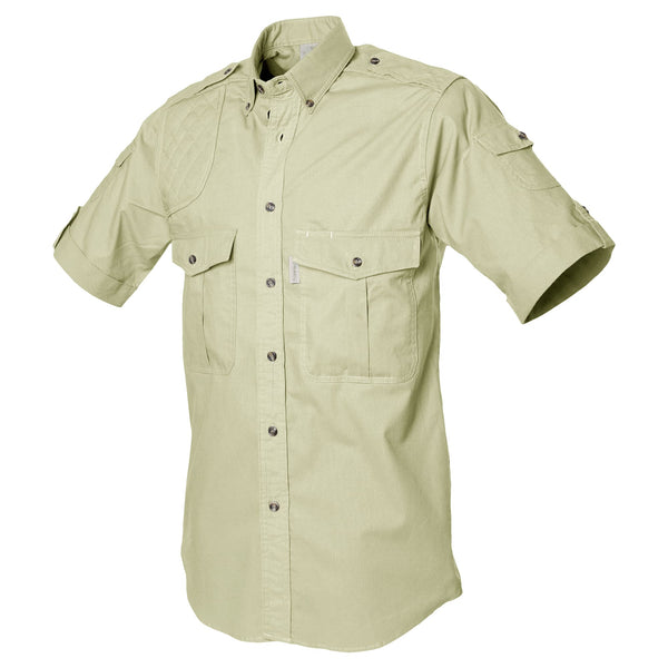 Side view of a Men's Shooter Shirt in Short Sleeves, color Stone. The shirt has a quilted shooting pad at the right shoulder, ammo pockets on the sleeves, two flap-covered chest pockets, button-down collars, functional cross-stitched shoulder straps, a button-front placket, double stitching throughout, and long rounded tails for tucking into pants. 100% cotton.