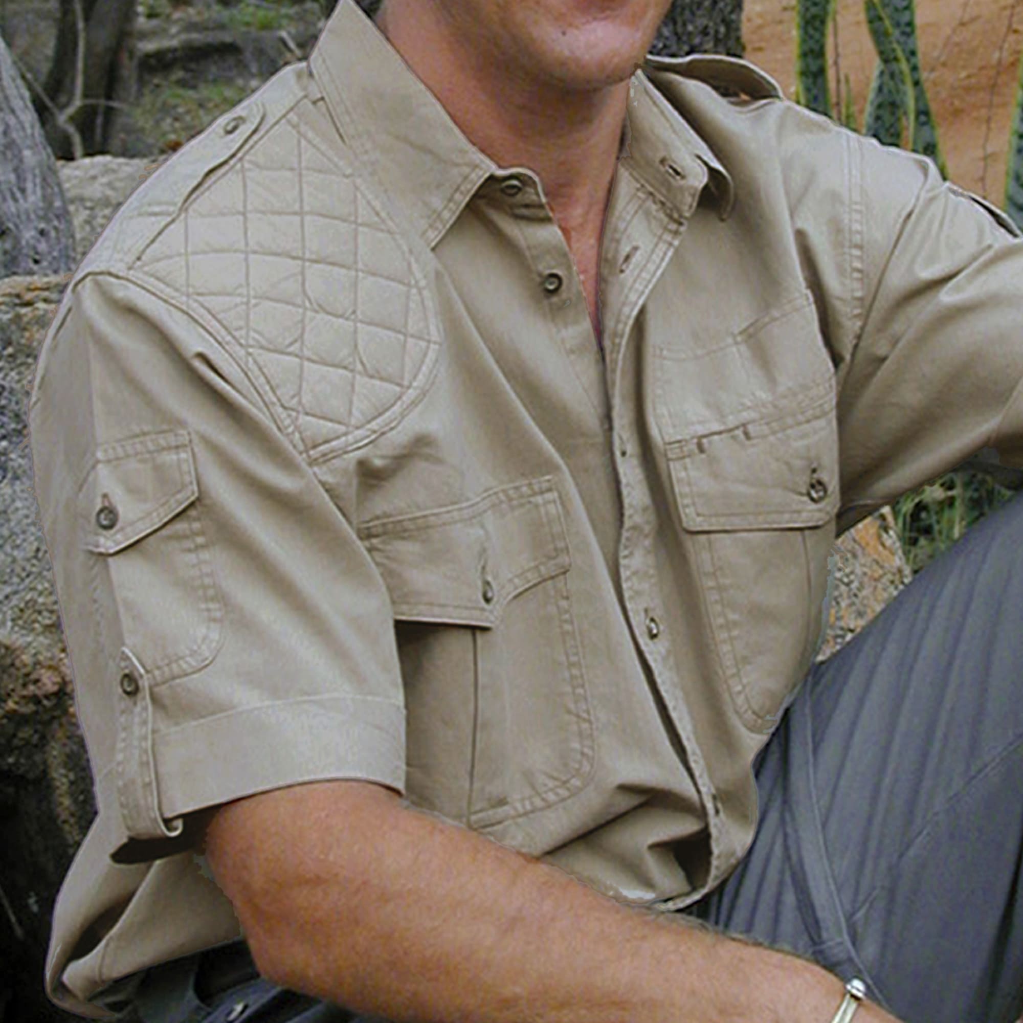 Tag Safari Short-Sleeve Shooter Shirt for Men features a quilted shooting pad, button-flap chest and sleeve pockets, and functional epaulettes. Shown in Khaki.--4