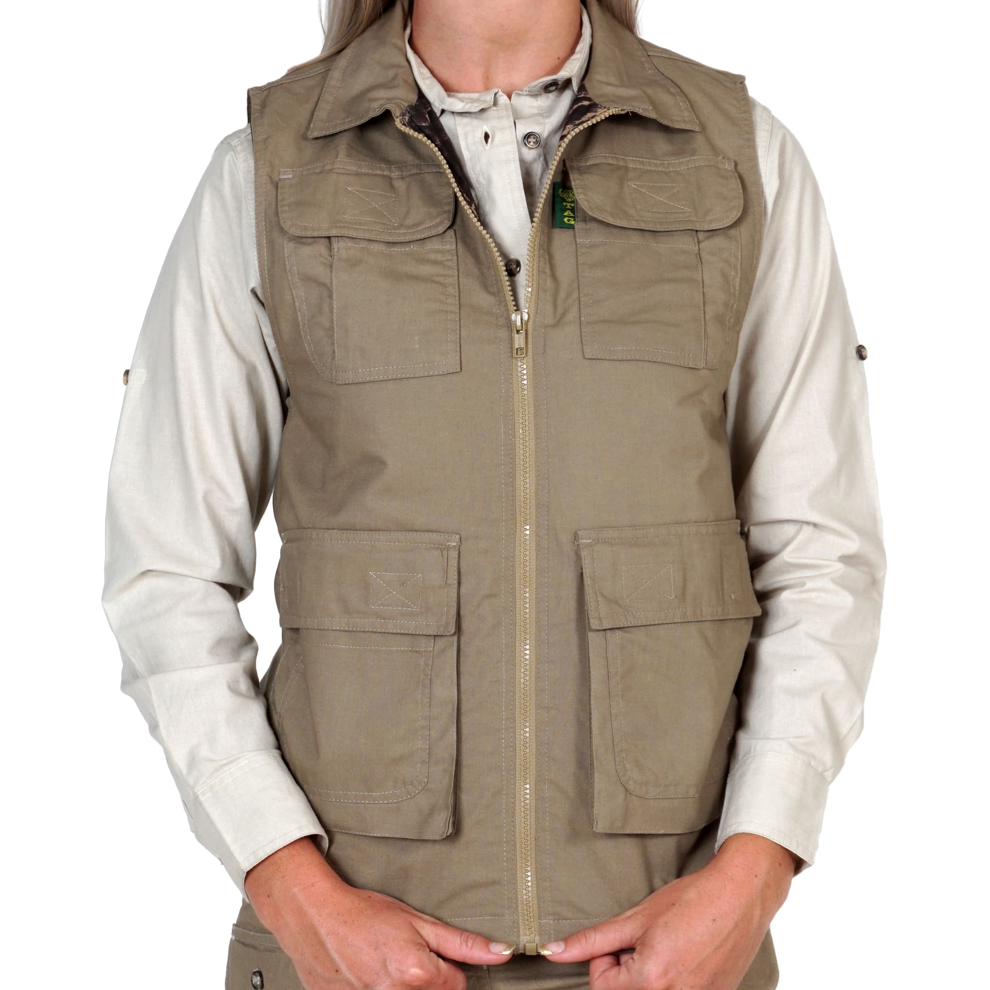Tag Safari Vest for Women features a full fabric inside liner, flap-covered chest and waist pockets, zippered inside security pockets, an oversized back utility pouch, and fold-up collar. Shown in Khaki.--3