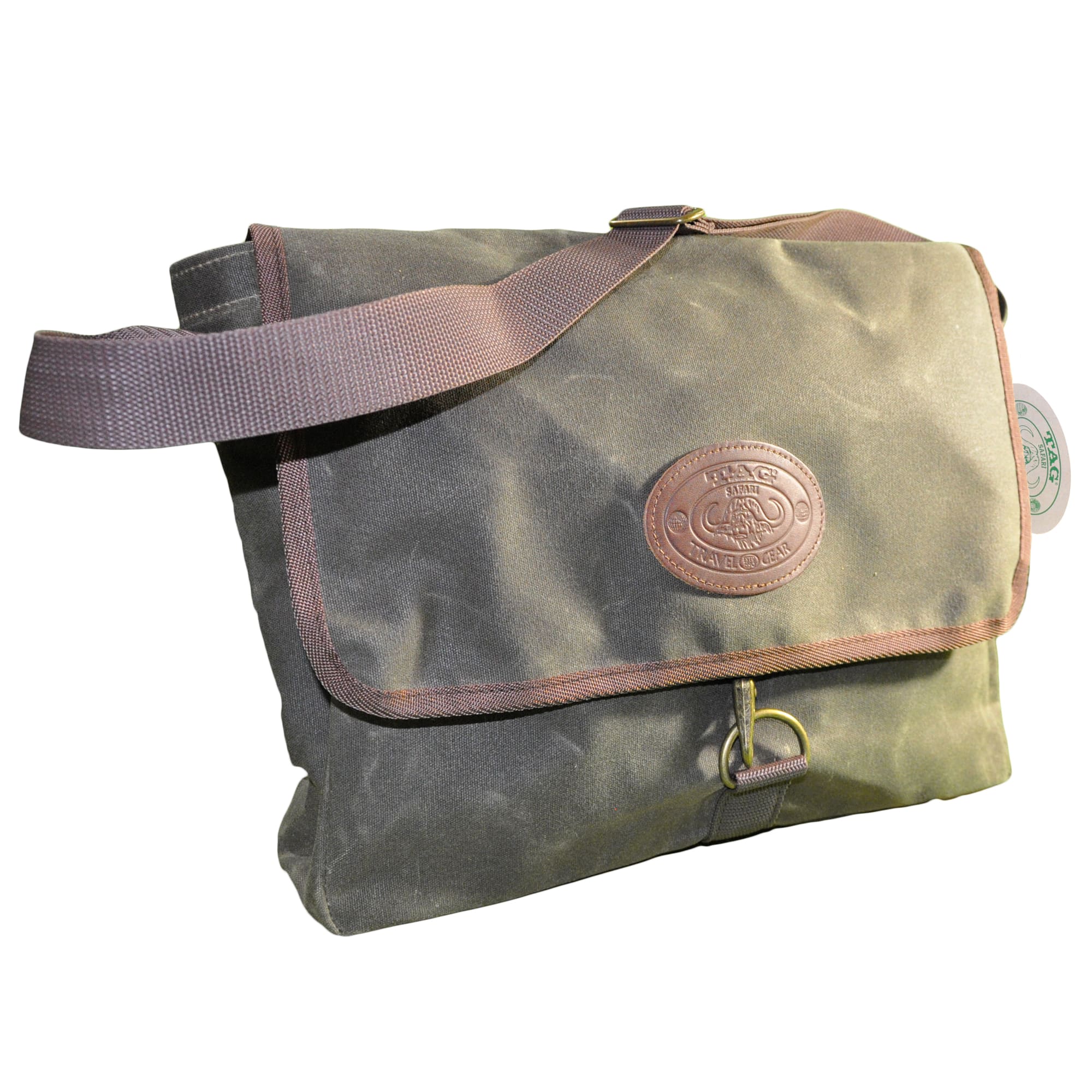 Waxed Cotton Canvas Messenger Bag from Tag Safari in Field Tan features a top flap with buckle, a drop-in pocket in back, an adjustable web shoulder strap, and an embossed Tag logo leather patch.--4
