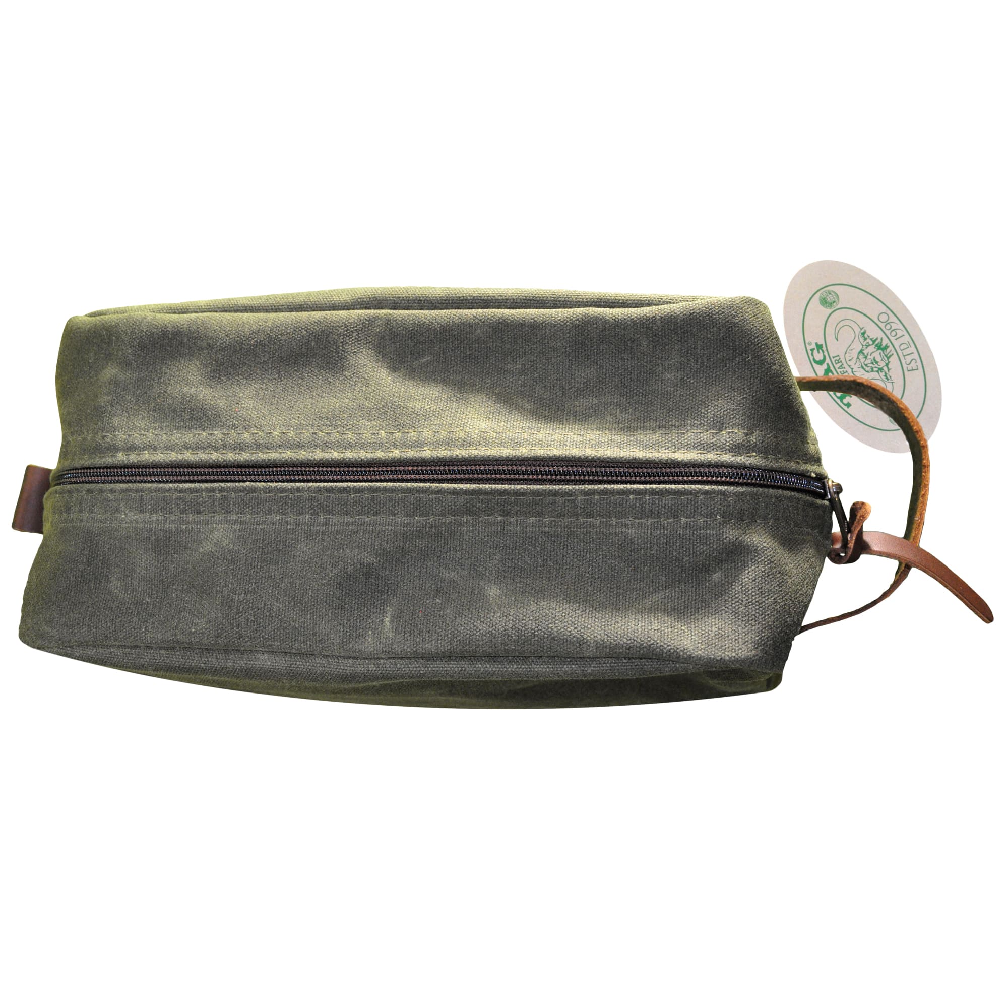 Top of a Tag Safari Waxed Cotton Canvas Toiletry Bag in Field Tan. Shows a zippered top, a leather hand strap, and a leather side loop.--6