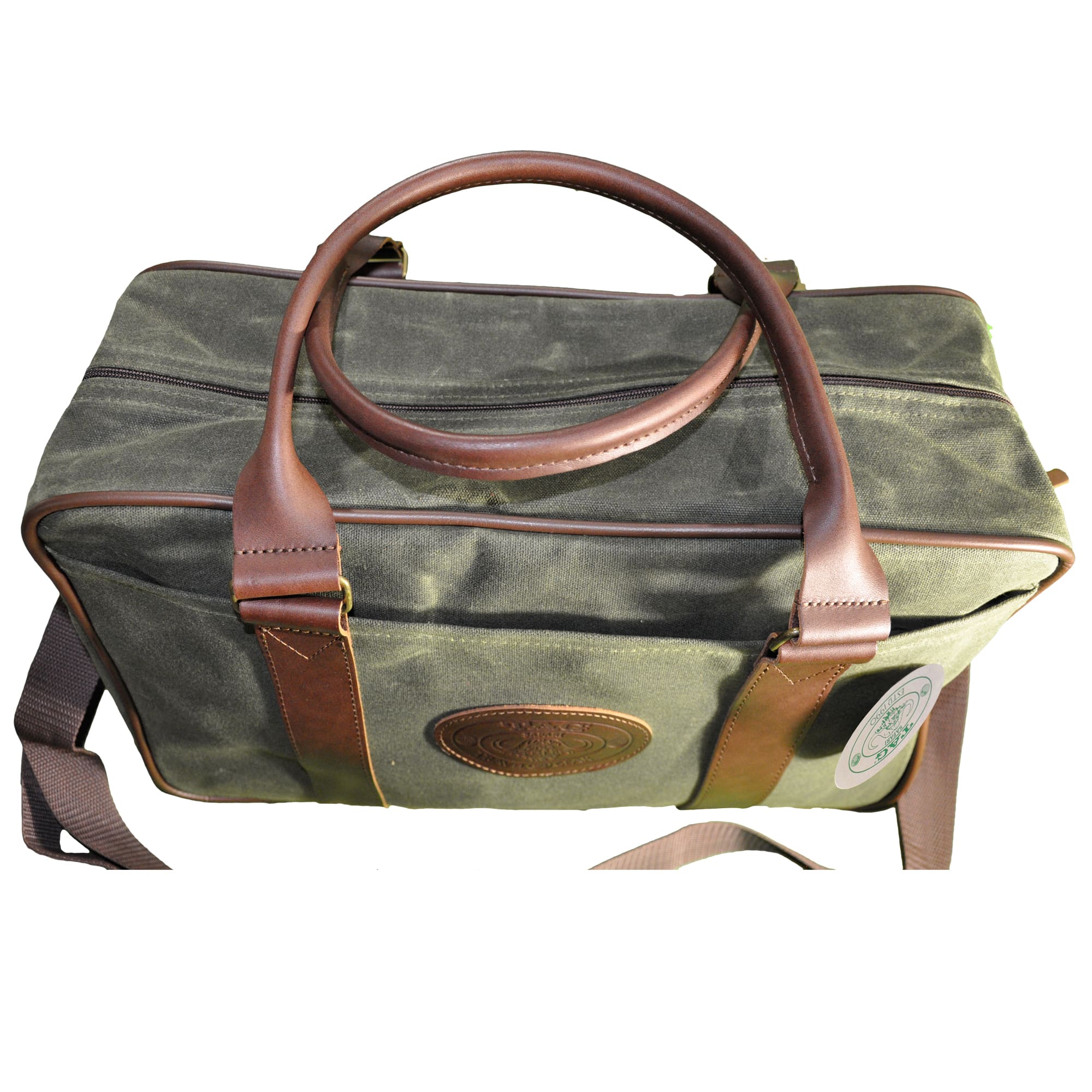 Top and front of a Tag Safari Waxed Cotton Canvas Weekender Bag in Field Tan. Shows a zippered top, a large front drop-in pocket, cushioned leather handles, and an embossed Tag logo leather patch.--6