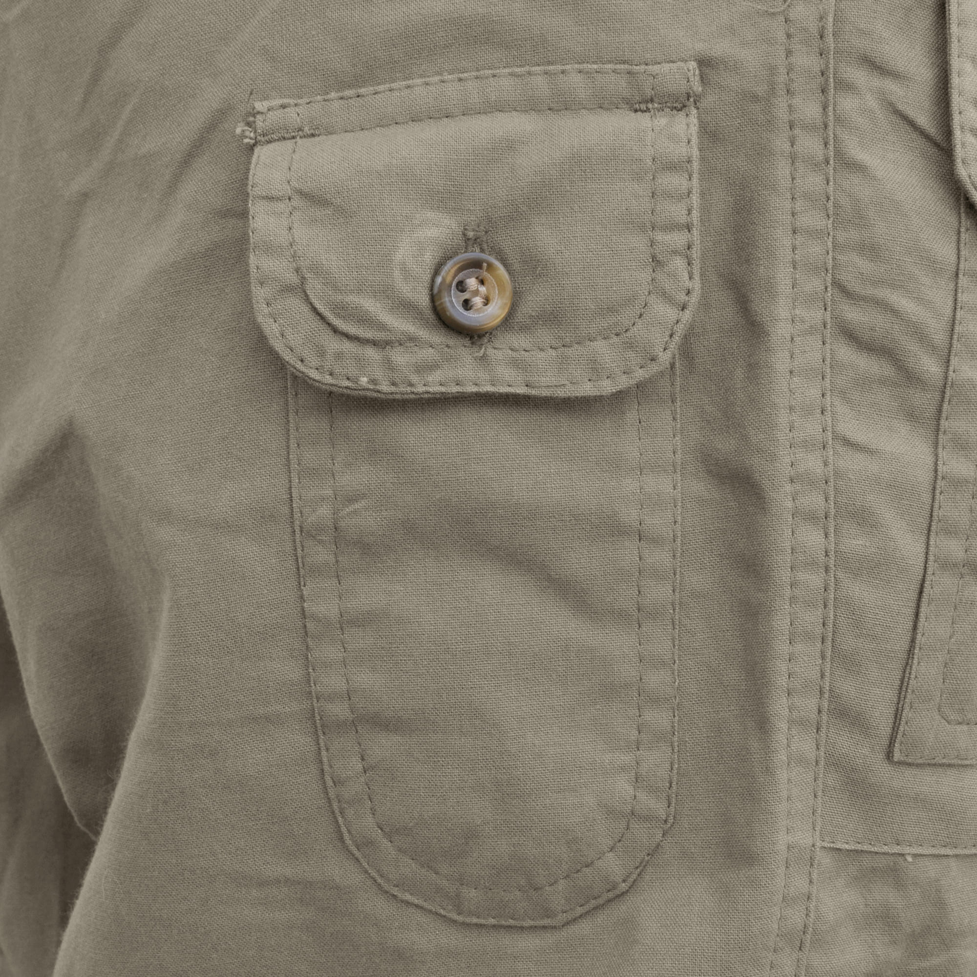 Tag Safari Zambezi Convertible Pants for Men feature zip-off legs, slash-style hip pockets, button-flap side, back, and utility pockets, discreet elastic waist panels, and large belt loops. Shown in Khaki.--9
