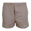 Front view of a pair of Go Wild Boxers, color Tan. The boxers have an elastic waistband, a buttoned front fly, and a Tag Buffalo label on the bottom front of the left leg. 100% cotton.