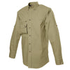 Side view of a Men's Left-Hand Shooter Shirt in Long Sleeves, color Khaki. The shirt has a sunray quilted shooter patch at the left shoulder, a zippered chest pocket, a flap-covered chest pocket, button-down collars, buttoned Swiss tabs on the sleeves, a button-front placket, double stitching throughout, and long rounded tails for tucking into pants. 100% cotton.