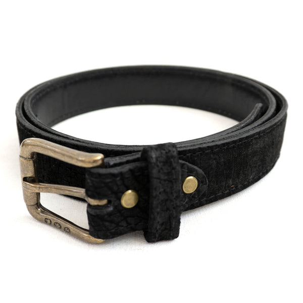 Front view of a Hippo Game Skin Belt, color Black. The belt has a solid brass buckle, five waist adjustment positioning holes, two Chicago-style belt length adjustment screws, a matching leather keeper loop, and a Tag Safari logo branded inside. Genuine game skin leather.