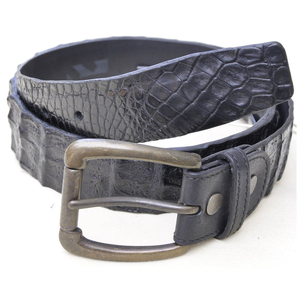 Front view of a Caiman Crocodile Game Skin Belt, color Black. The belt has a solid brass buckle, five waist adjustment positioning holes, two Chicago-style belt length adjustment screws, a matching leather keeper loop, and a Tag Safari logo branded inside. Genuine game skin leather.